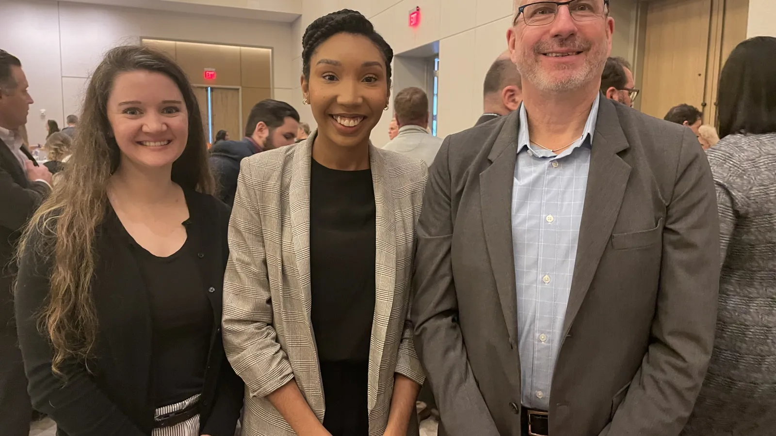 Nicole Hall, Gerika Logan, and Harvey Miller standing next to each other