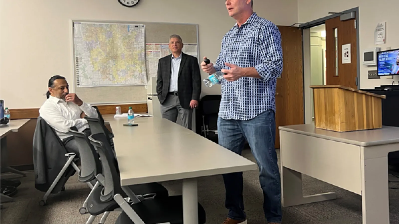 James Hofmann speaking at CURA event