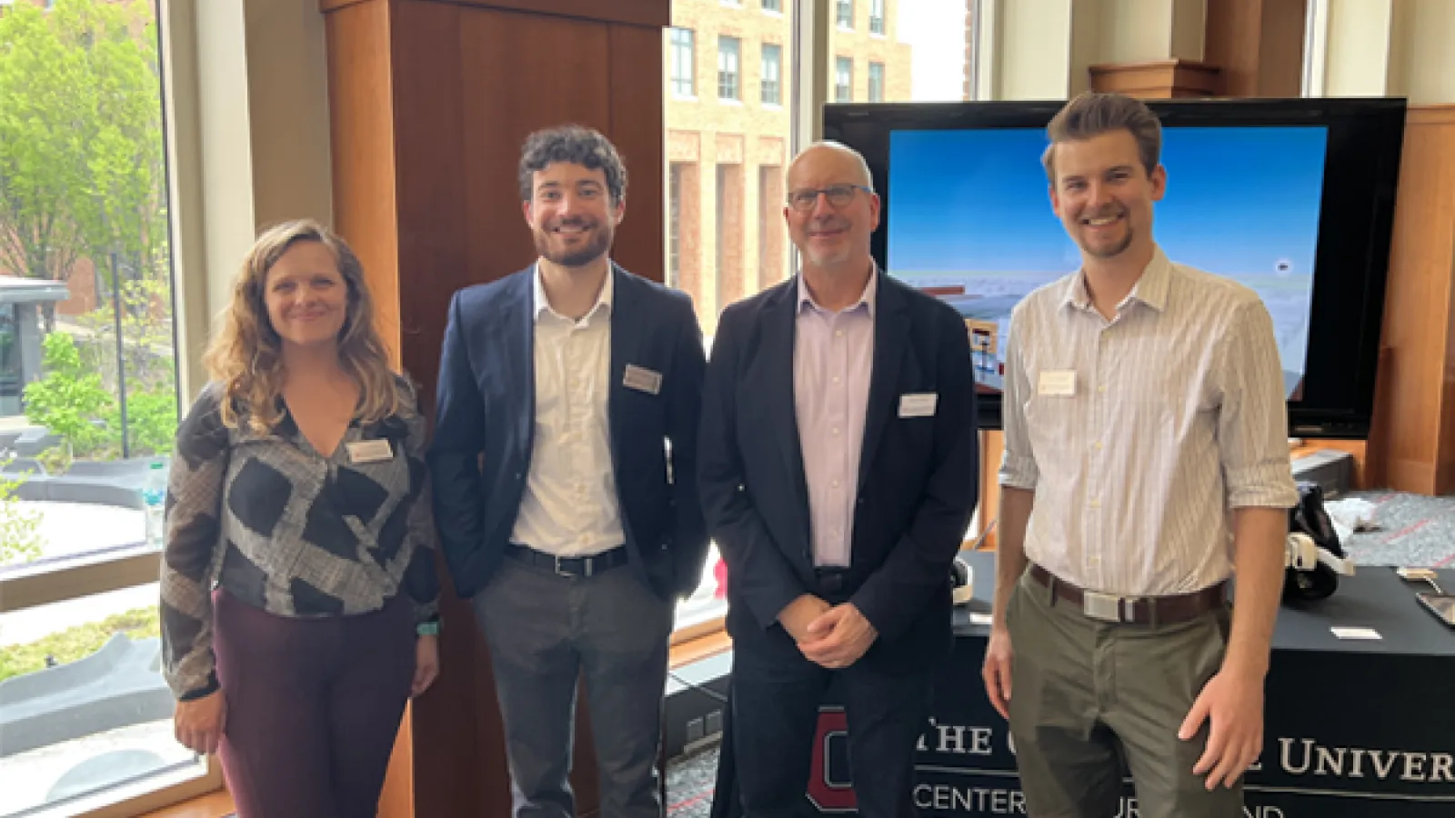 The CURA team at the Dean's Advisory Council meeting