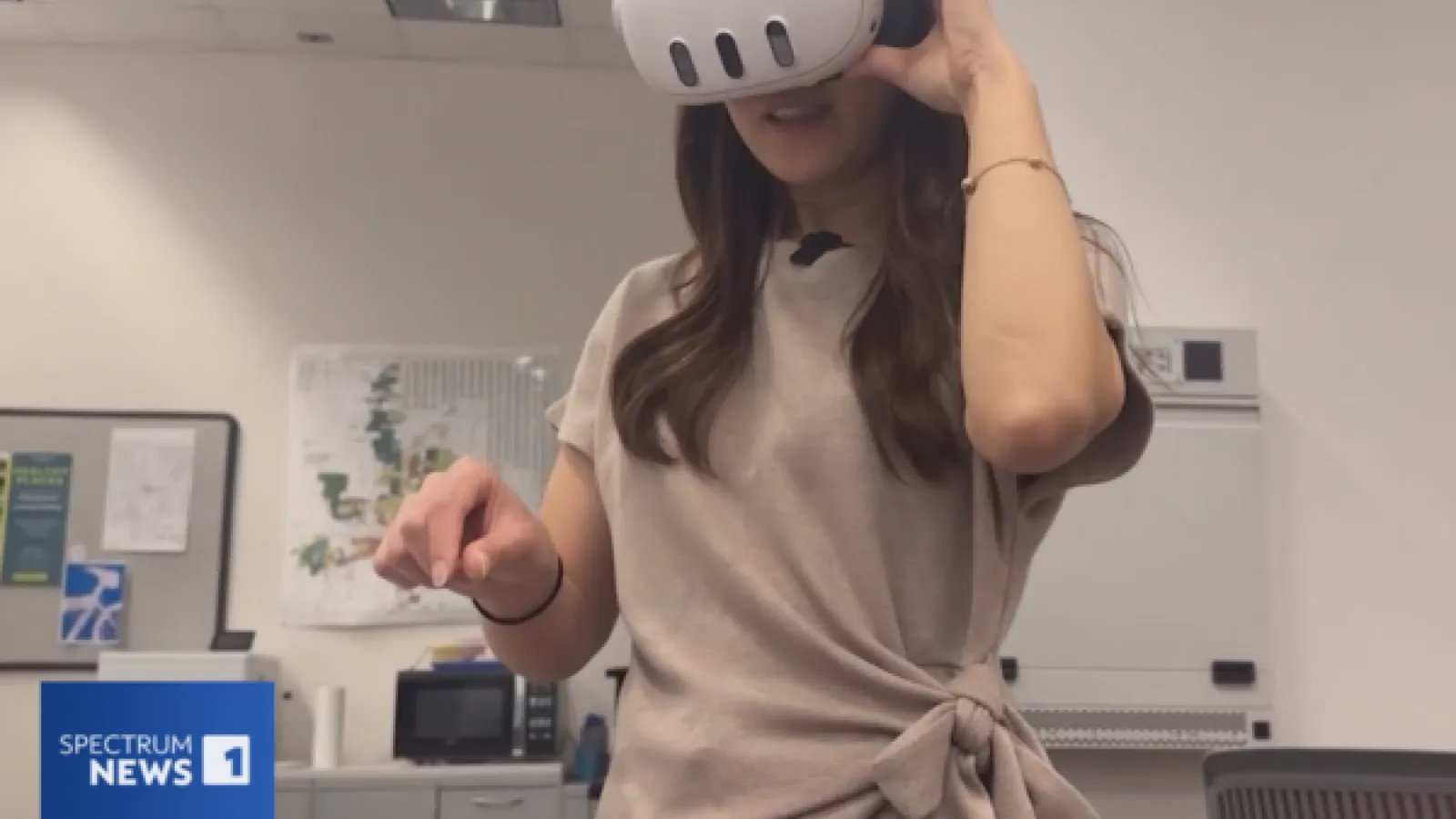 Summer Ha demonstrating the Poindexter Village VR