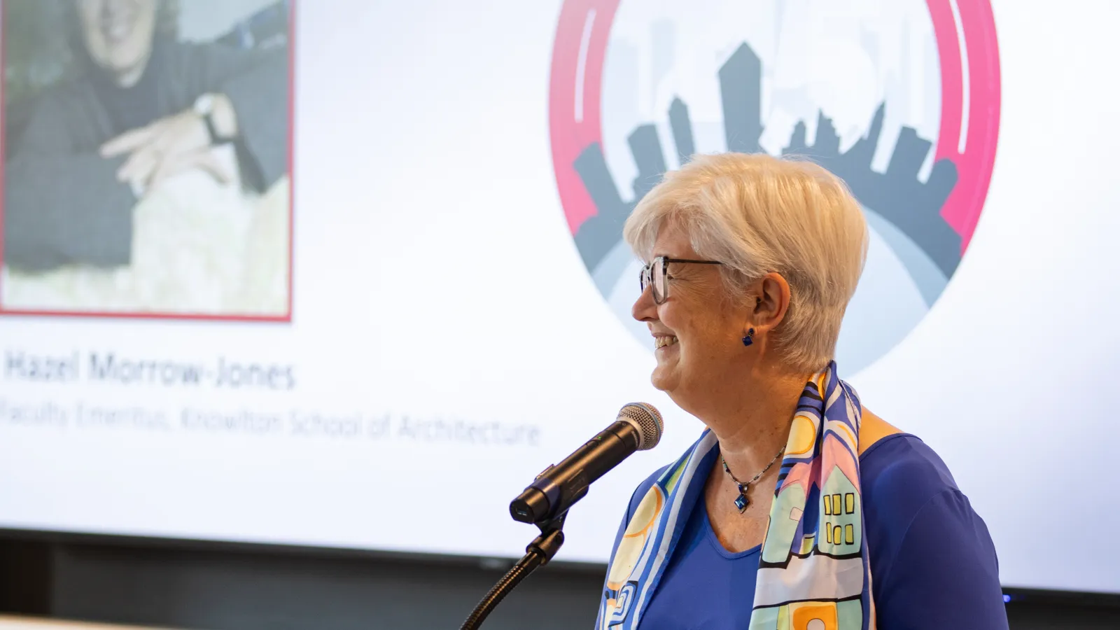 Hazel Morrow-Jones speaking at podium