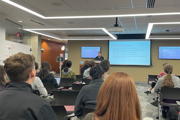Josh Sadvari speaking at GIS Day 2024