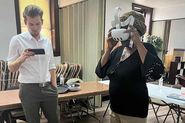Participant trying out Ghost Neighborhoods VR experience