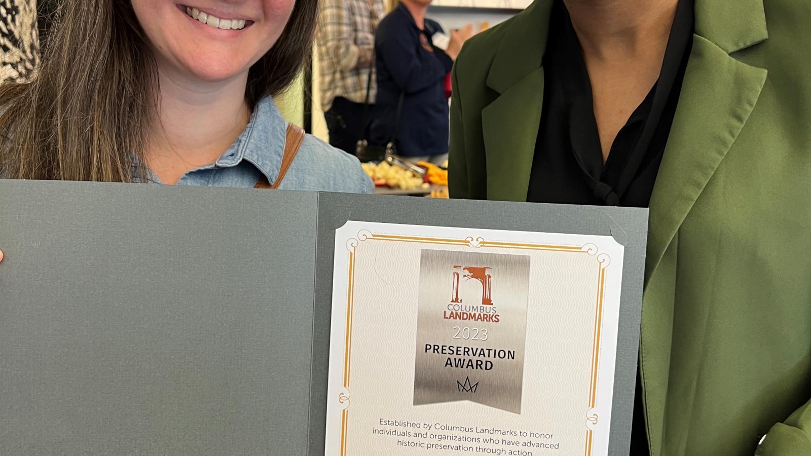 Nicole and Gerika with Award 